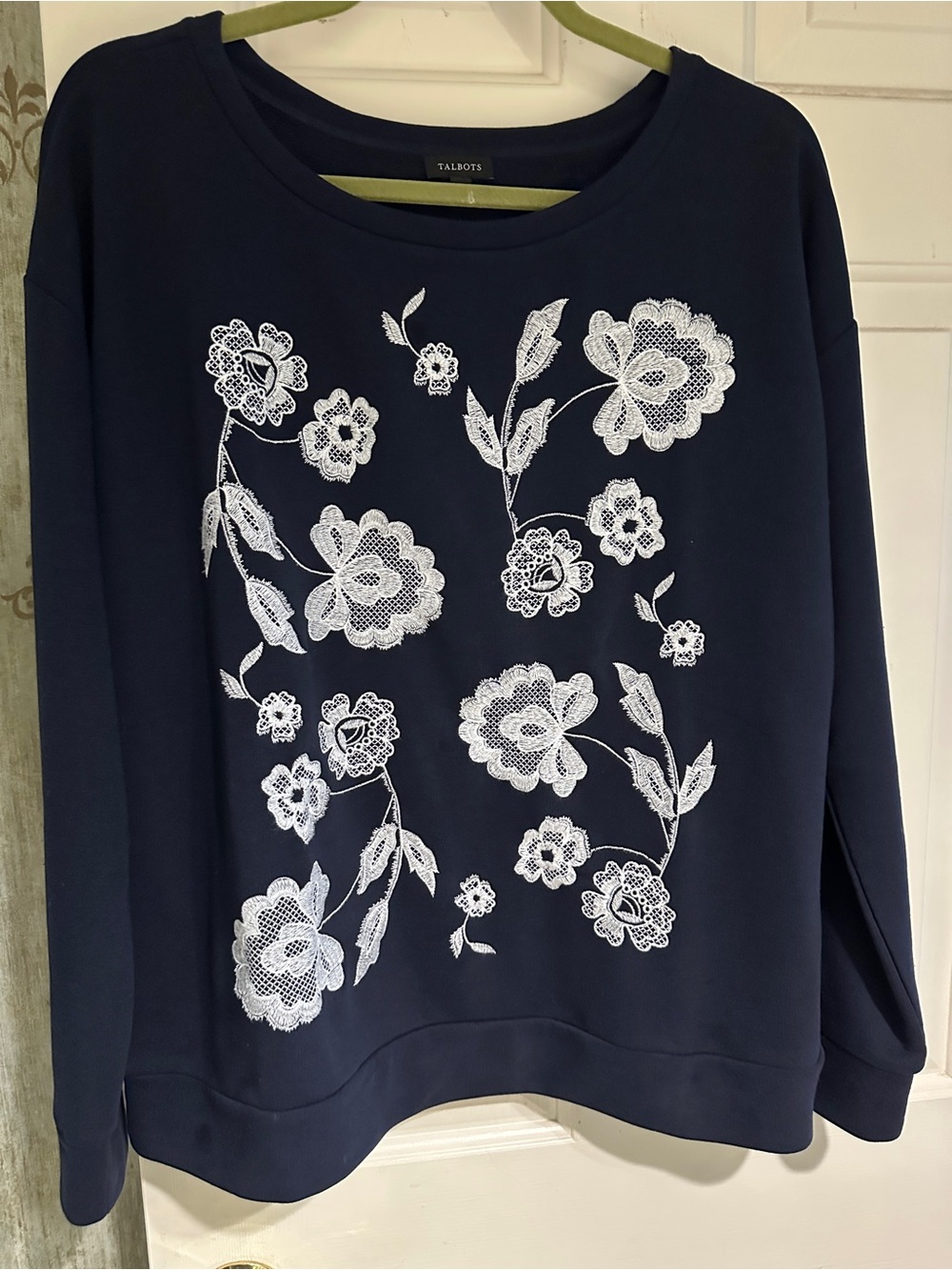 Talbots, recent purchase, indigo sweatshirt with white embroidery on front